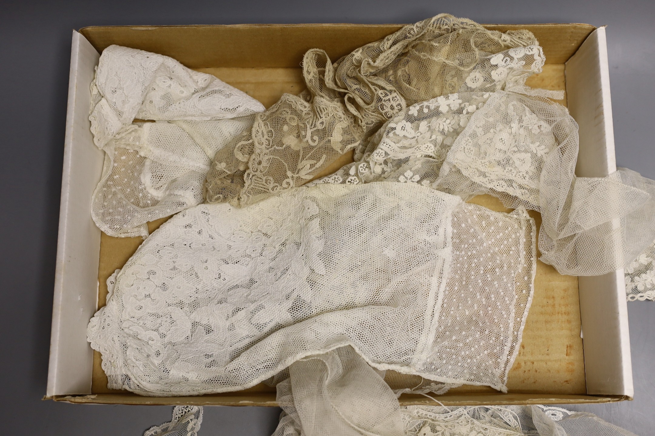 19th century Brussels bobbin lace bonnet veil, a Honiton edged and spot motif veil, a needle run veil and bonnet veil, two needle run collars, a Carrick & Cross collar and two pairs of sleeves.